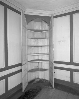 Interior. View of first floor South room/ drawing room from West showing china closet open with its closing pin