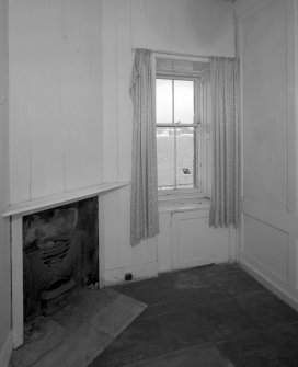 Interior. View of first floor North East room/ dressing room from West showing fireplace