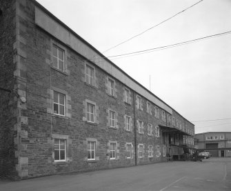 Selkirk, Dunsdale Haugh, Dunsdale Road, Riverside Mills
View from south of south east side of original spinning mill. At the time of the survey, the mill was used predominantly as a warehouse.