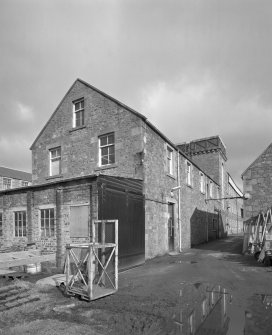Selkirk, Dunsdale Haugh, Dunsdale Road, Riverside Mills
View from south of south west end of engineers' shop, with former engine house in background