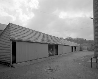 Selkirk, Dunsdale Haugh, Dunsdale Road, Riverside Mills
View from north of wooden waste wool store, situated in front of the south east side of New Mill