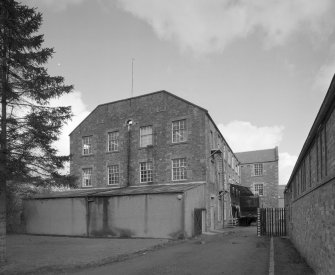 Selkirk, Dunsdale Haugh, Dunsdale Road, Riverside Mills
View from south of south west end of New Mill (with 1863 dateplaque).  At the time of the survey, it was being used as multi-storeyed warehouse