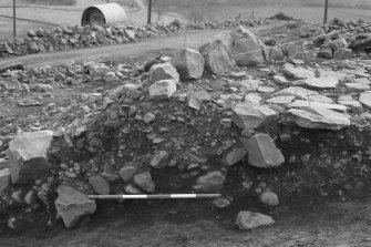 Area 2  Section through apron, from E