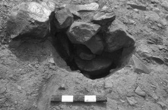Area 1 F1059  Half-section with beehive quern, from E