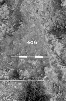 Excavation photograph : area IV - f406 in extension KURT, from west.