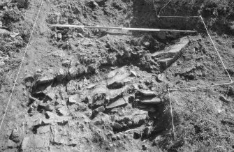 Excavation photograph : area V - bedrock, west end, looking east.