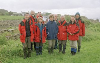 RCAHMS Muck Survey. The Muck survey team with the MacEwens of Port Mor House.