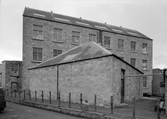 View of main building and triangular plan ancillary building, Bongate Mill, Jedburgh from north east