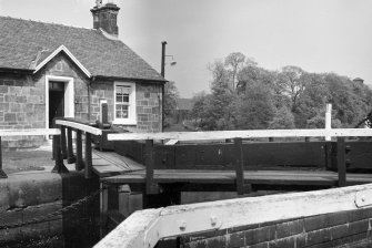View of lock gates and the lock-keeper's cottage, Wyndford Lock, Forth and Clyde Canal, from west