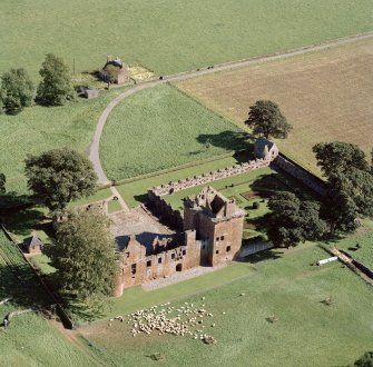 Oblique aerial view centred on Edzell Castle and garden.