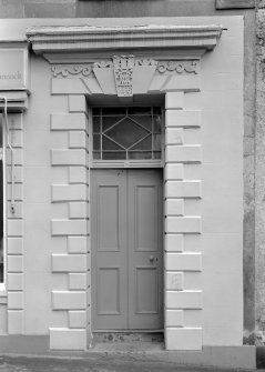 Detail of main entrance doorway to 16 Canongate, Jedburgh, showing the date 1729 above the door.