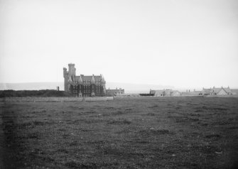 Distant view of front elevation of Thurso Castle