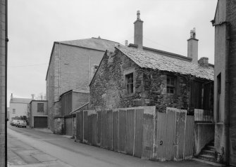 View of rear of the Drill Hall (former Boston Church or Old Relief Church), High Street, Jedburgh, and adjacent building from Queen Street from north showing modern additions.