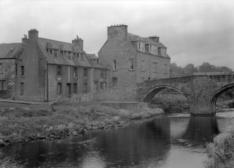 View of Duck Row and Canongate Bridge, Jedburgh from south east from east riverbank.
