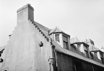 Detail of roof and gargoyle sitting on crowstep , 1 Duck Row, Jedburgh (The Piper's House).