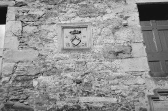 View of heraldic plaque dated 1866 at 40 Canongate, Jedburgh