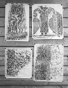 Photographic copy of four rubbings showing details of St Andrews no.9 cross slab and Kirriemuir no.4 cross slab at the top and two unidentified carved stones.