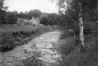 View of Barr villlage from across the river showing the war memorial.