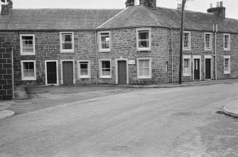 View of houses on the east side of Willoughby Street, Muthill, including The Roundel