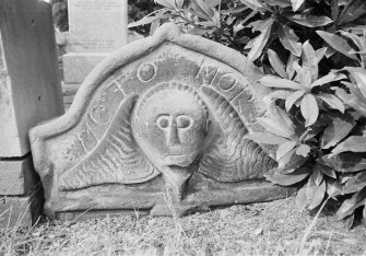 View of fragment of headstone in Dollar Old Parish Churchyard dated 1741.