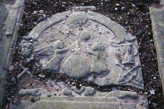 Detail of late 16th century tablestone with scene from Quarles' Emblem Books, Arbroath Abbey Churchyard.