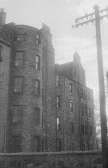 View of the rear of the north side of Buccleuch Place, Edinburgh, seen from the north east from Mews Street.