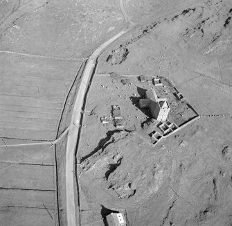 Oblique aerial view of St Clement's Church, Rodel, Harris