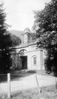 Copy of historic photograph showing detail of entrance gateway and cupola.