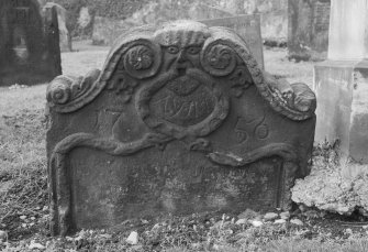 View of east face of gravestone inscribed: 'AY.IM. 1756', in the churchyard of St Serf's Parish Church, Alva.