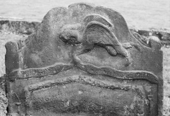 View of west face of gravestone dated 1756, in the churchyard of St Serf's Parish Church, Alva.