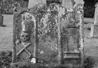 View of gravestone of Weaver 1729, in the churchyard of St Serf's Parish Church, Alva.