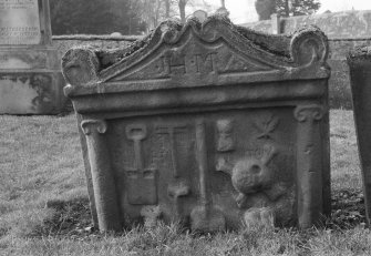 View of gravestone inscribed: 'JH.M', in the churchyard of St Serf's Parish Church, Alva.