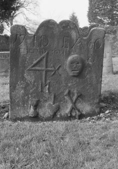 View of gravestone, dated 1760 with initials 'I D' and 'E A', in the churchyard of St Serf's Parish Church, Alva.