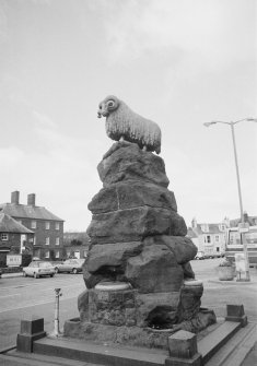 View of the Ram Fountain, High Street, Moffat, from S.