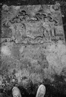 Detail of tablestone commemorating John Gilchrest in the burial ground of Benoch Parish Church.