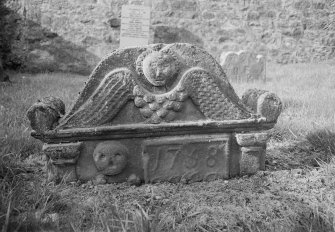 View of the upper part of gravestone dated 1758 in the churchyard of Alloa Old Parish Church.