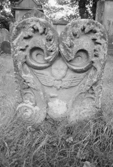 View of headstone dated 1719 in the churchyard of Minigaff Old Parish Church.