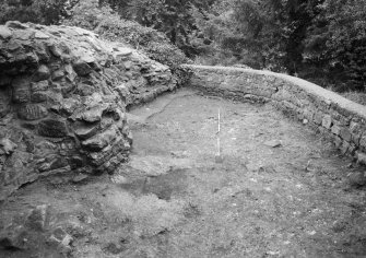 Excavation photograph : general view of area to W of ruins, looking south.