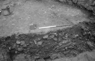 Excavation photograph : section 5, south facing section of sondage to west of ruins, looking north, east end.
