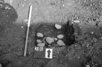 Excavation photograph : trench O - cobbles, looking north.
