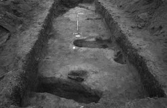 Newhall Point excavation archive
Frame 5: Trench D, looking N. Graves G32, G35, G37, G33.