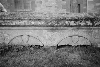 Detail of side panel of chest tomb to James Borland 1713 in the churchyard of Bedrule Church.