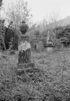 General view of pedestal tomb dated 1771 and obelisk dated 1805 in Cavers Old Churchyard.