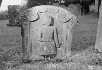 View of rear face of gravestone commemorating John Scott, a tenant farmer, who died in 1752 and his wife, Jean Goodfellow, who died in 1783, Teviothead Churchyard.