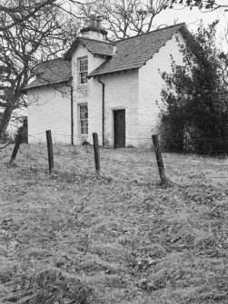 General view of cottage by walled garden, Parton House, from N.