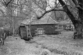 View of Gelston Castle saw mill from S showing waterwheel.