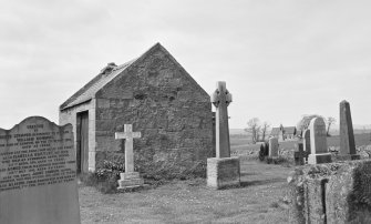 General view of Whitsome Old Parish Churchyard and watchhouse.