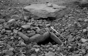 Excavation, view of cist and capstone