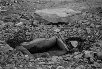 Excavation, view of cist and capstone