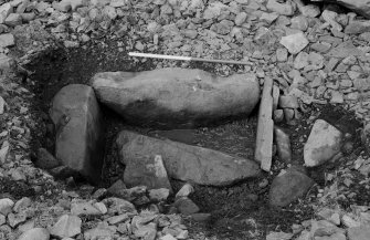 Excavation, view of cist.